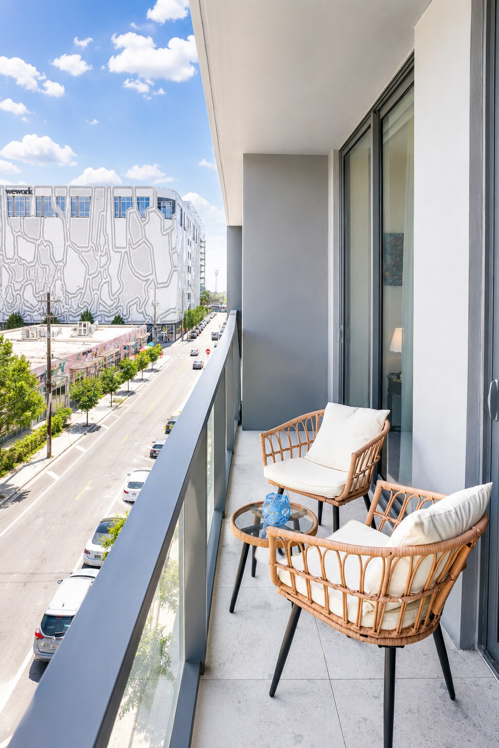 Private balcony seating with Wynwood street art and city views