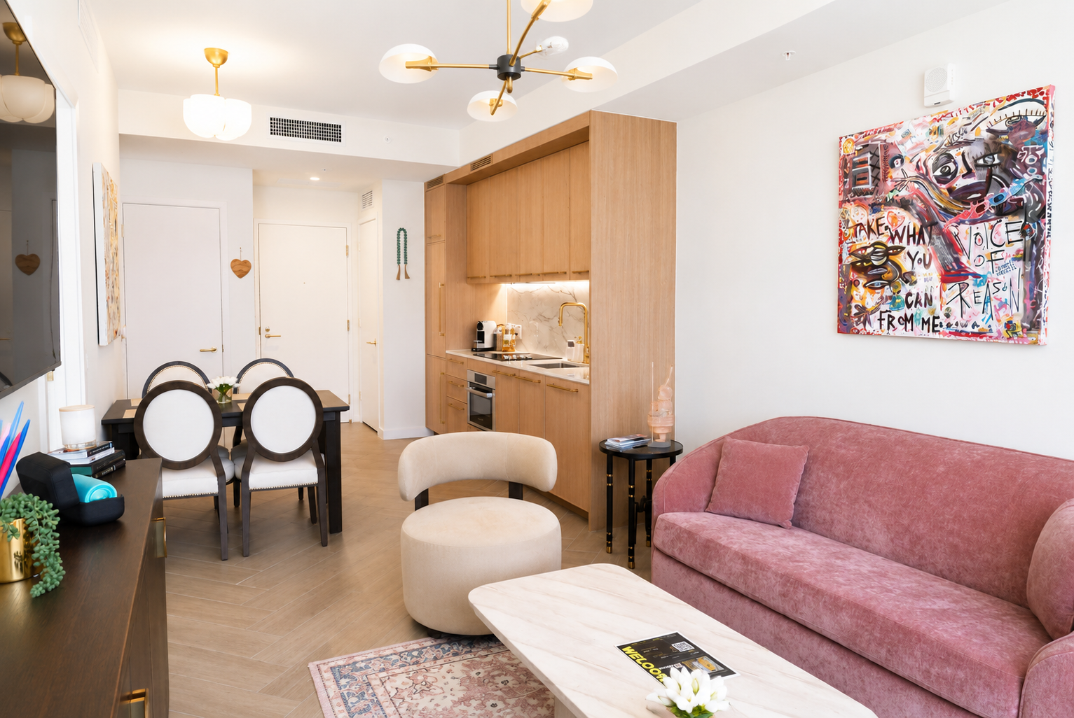 Living room and dining area, open plan with art