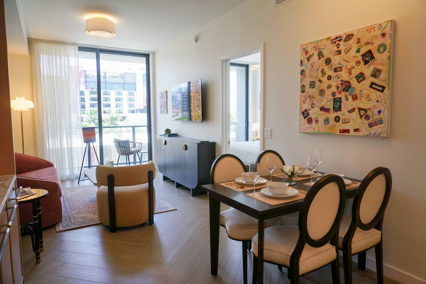 Open-plan living and dining with the gallery wall